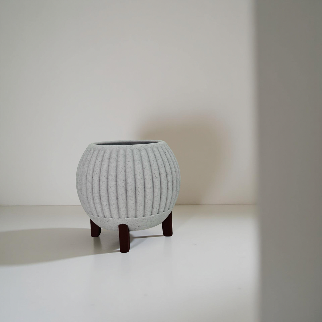 3D Printed Grey Marble Planter with Black Legs