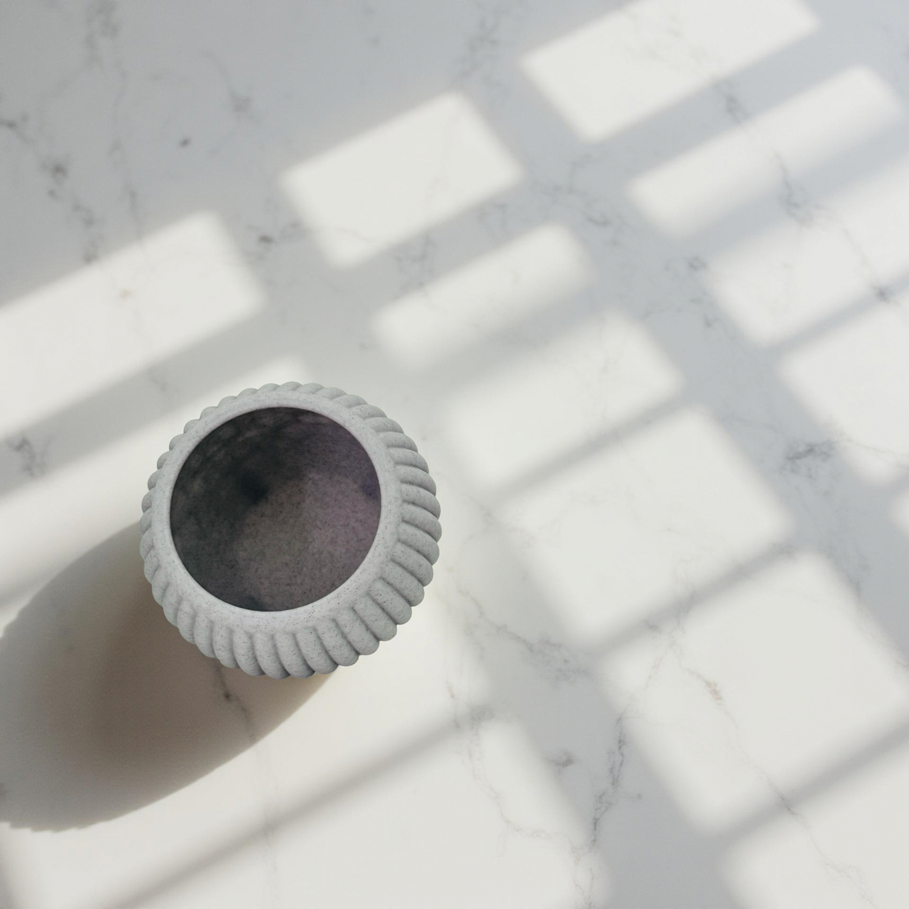 3D Printed Grey Marble Planter with Black Legs