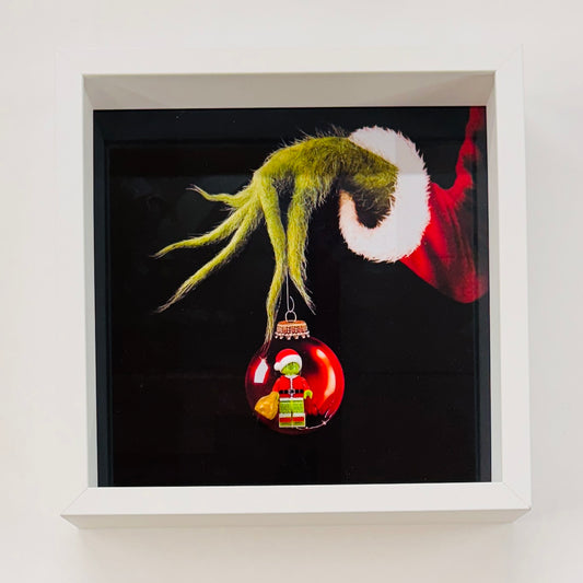 The Grinch figure in a Frame