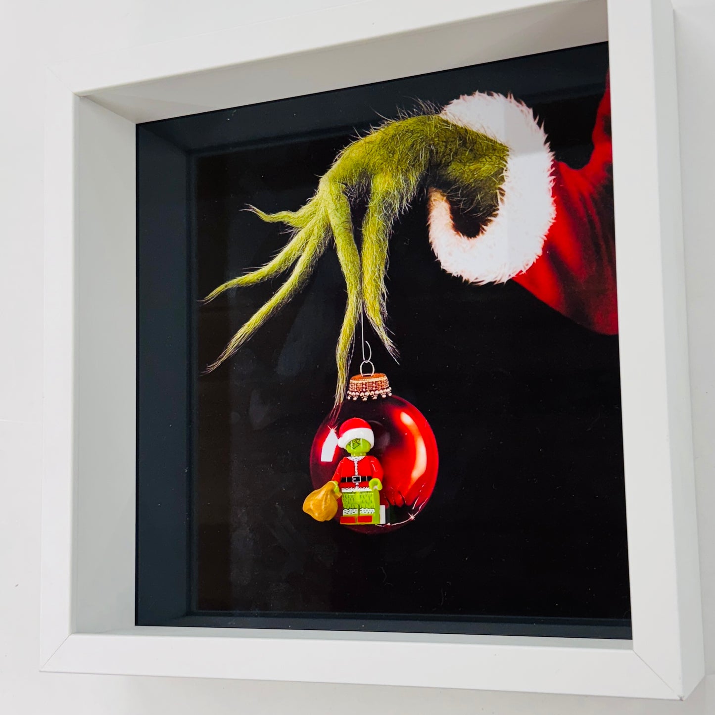 The Grinch figure in a Frame