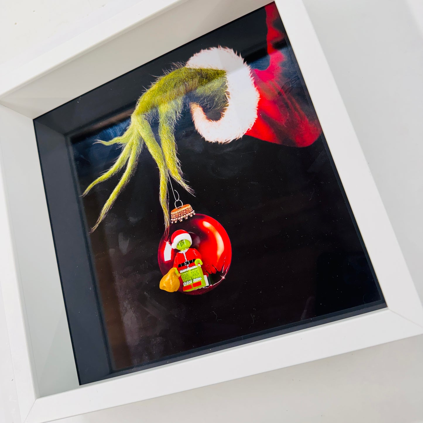 The Grinch figure in a Frame