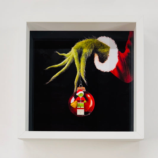 The Grinch figure in a Frame