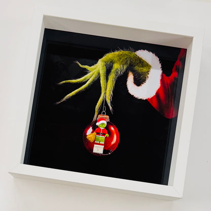 The Grinch figure in a Frame