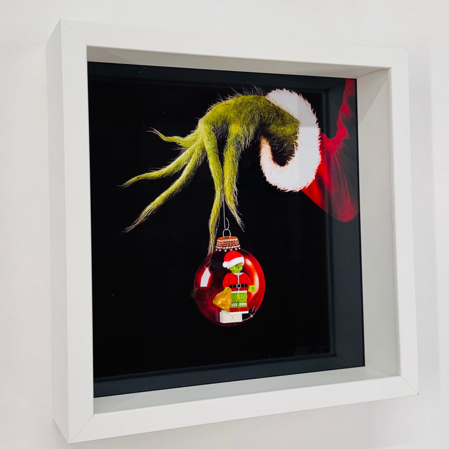 The Grinch figure in a Frame