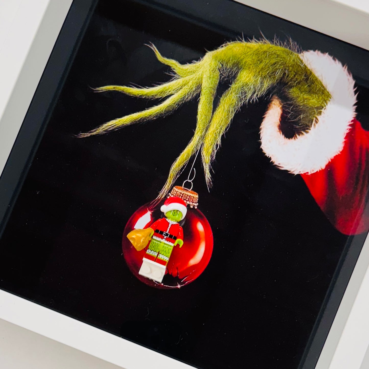 The Grinch figure in a Frame