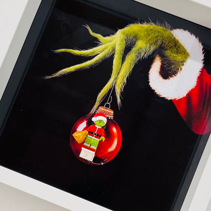 The Grinch figure in a Frame