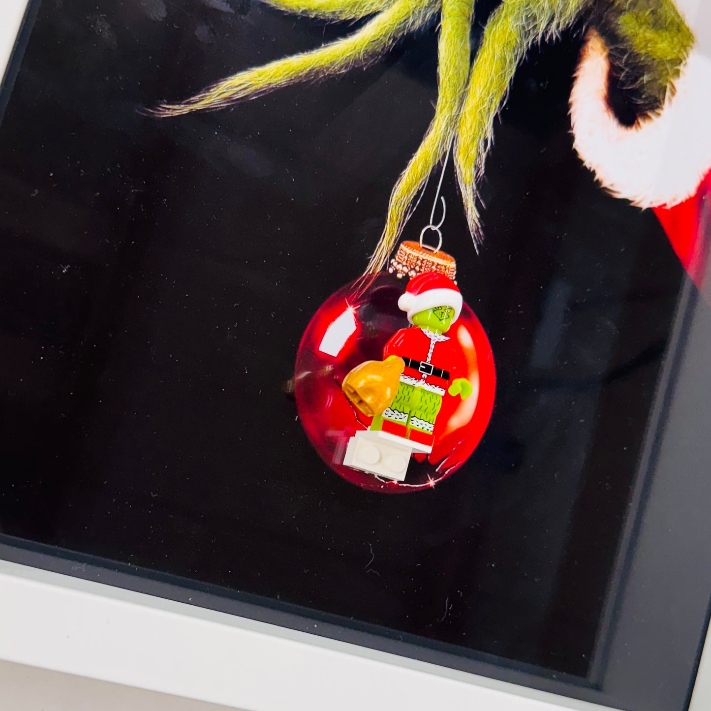 The Grinch figure in a Frame